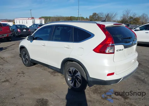 2016 Honda Cr-V Touring z USA, uszkodzony, nr VIN 5J6RM4H91GL034943